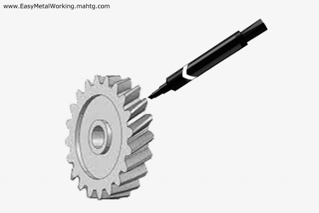 Paint three or four gear teeth with the pen marker